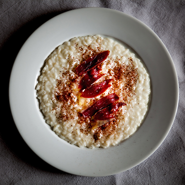 Risotto all'aceto di lamponi, magret e polvere di barbabietola