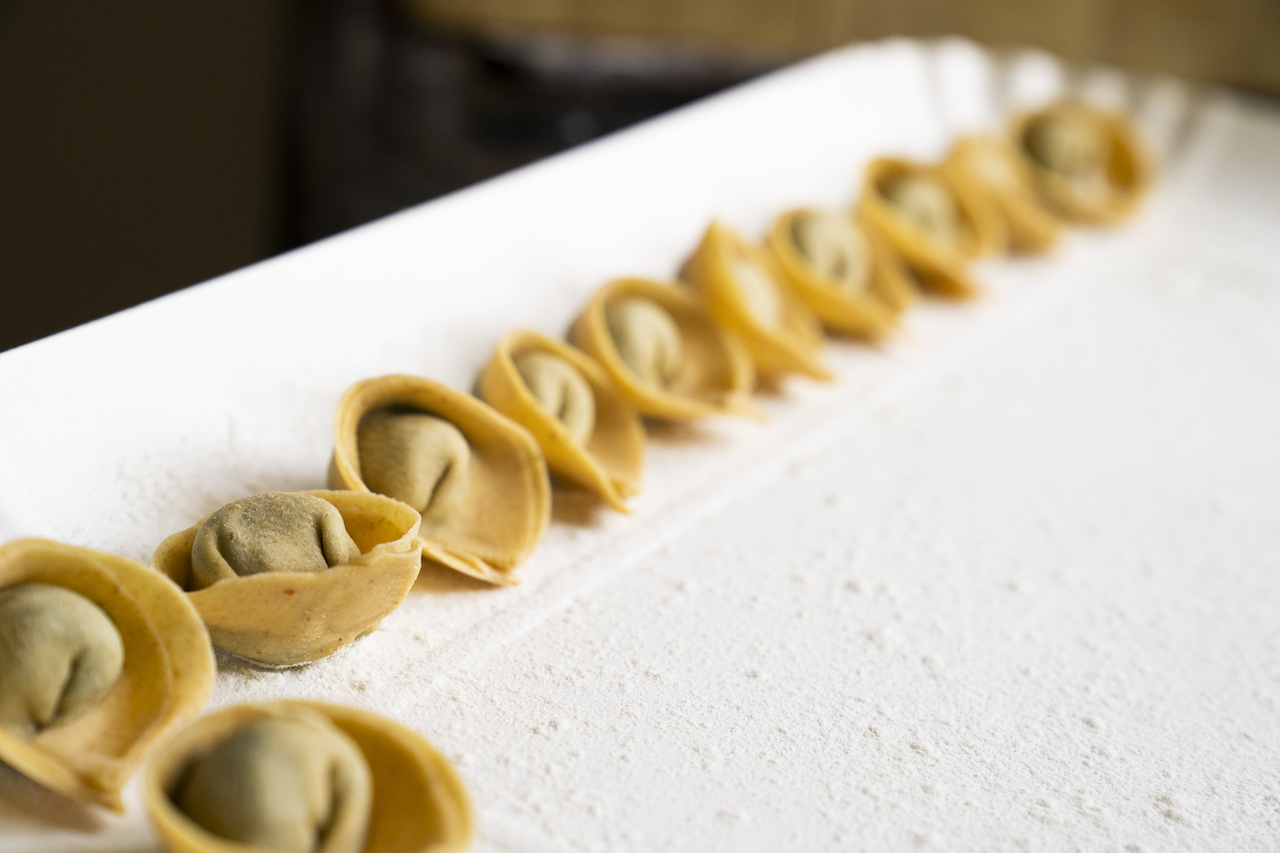 Cappellotti di farina di zucca e biete.