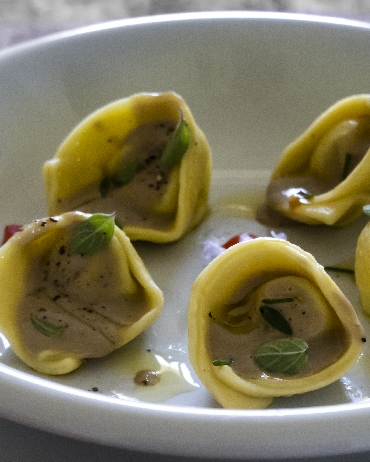 Ravioli di branzino con il suo fondo